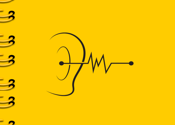Kolorowa grafika. Czarny szkic ucha z którego wydobywa się szkic fali dźwiękowej. Po lewej żółte spirale przypominające kółeczka spinające zeszyt. Tło jest żółte.